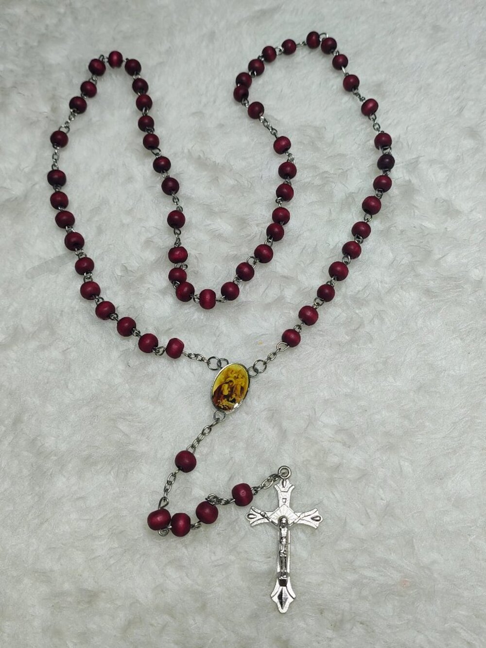 Red wooden rosary with silver accents